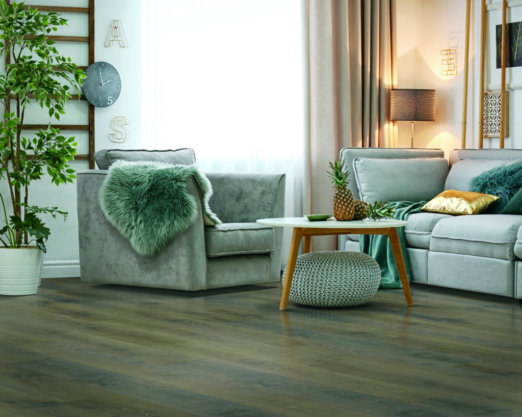 Living Room with TORLYS Reclaime Laminate flooring in Wilson Oak