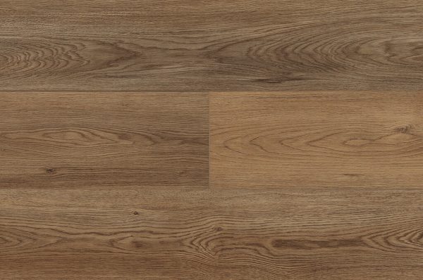 Spanish Point* floor panels feature a natural oak grain pattern with light and medium brown tones and subtle, wavy wood textures for a realistic, warm look.