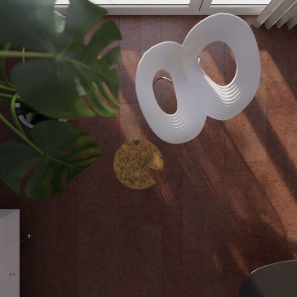 Top-down view of a Vintage Western Saddle, a large green monstera plant, and a round yellow rug on a brown wooden floor, with sunlight streaming in from a window.