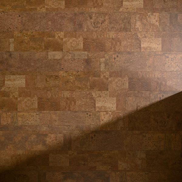 Boulevard Natural cork wall tiles in rectangular shapes and varying brown shades are illuminated by a diagonal beam of light from the lower right corner.