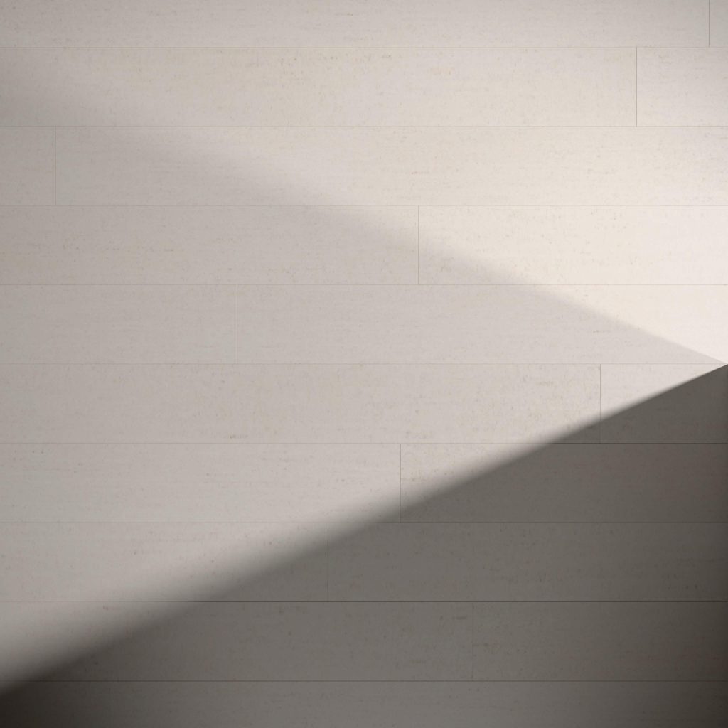 Minimalist image of Paseo Fulwell: a light beige wall with horizontal lines and diagonal shadows forming geometric shapes. Shadows cross from bottom left to upper right, adding contrast and depth.