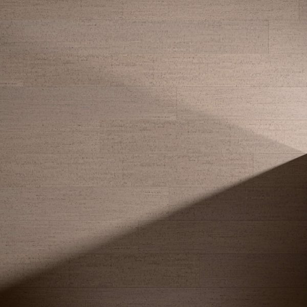 The Paseo Merida features a smooth, light brown wooden surface with horizontal planks. A triangular shadow casts diagonally across the right side, highlighting the contrast between illuminated and shaded areas.