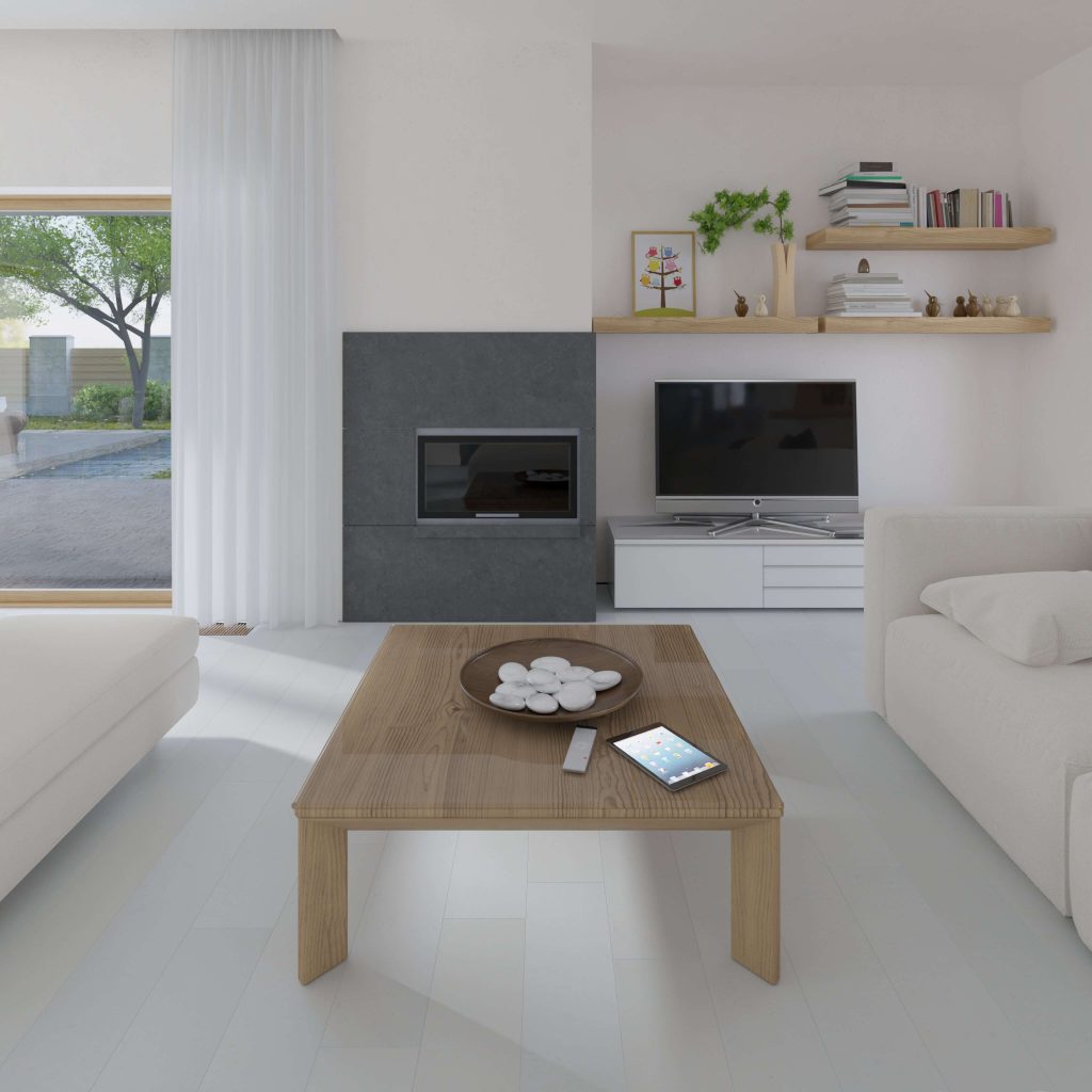 Modern living room featuring Burl African Ivory sofas, a wooden coffee table with a bowl of white stones and tablet, wall-mounted TV, shelves with books and decor, fireplace, and large garden-view window.
