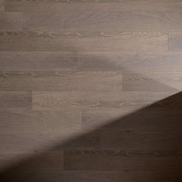 Otter Oak* features light brown wooden floorboards with visible grain patterns, partially covered by a diagonal shadow on the right side of the image.