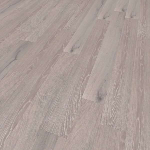 Eaglecrest Oak features a light gray wooden floor with a subtle grain pattern and matte finish. Wide planks are laid side by side, and the image shows the floor surface from a slightly angled perspective.