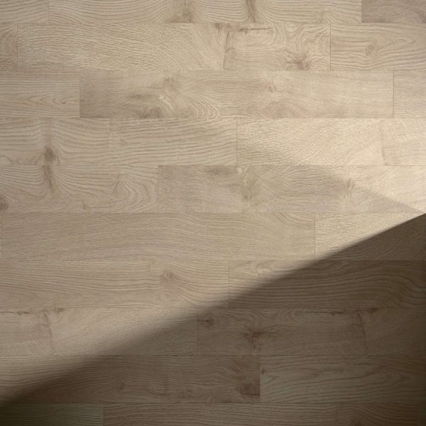 Helen light wood flooring features a natural grain pattern and a smooth, clean surface, partially covered by a diagonal shadow in the lower right corner of the image.
