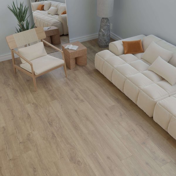 Modern living room featuring Vermilion: a cream-colored sofa with beige and orange pillows, light wood flooring, a wooden chair with woven seat, small side tables, a tall lamp, a plant, and a large wall mirror.