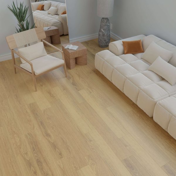 Minimalist living room featuring the Bow beige tufted sofa with pillows, light wood flooring, a modern wooden chair, side table, floor lamp, mirror, and a potted plant in the corner.