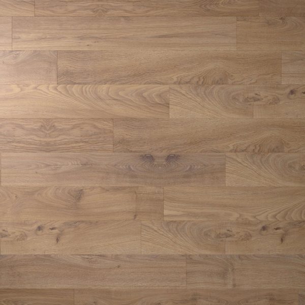 Woolley* features light brown wooden planks with a smooth finish and visible natural grain. Arranged in a staggered pattern, this flooring creates a warm and inviting look for any space.