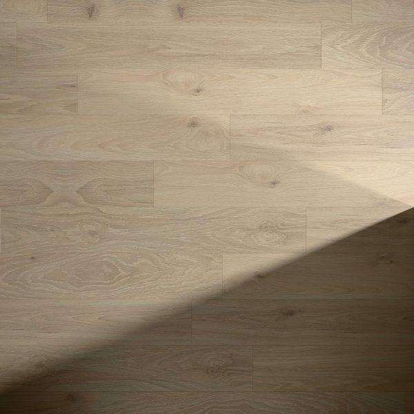 Athabasca light wooden floor features visible natural grain patterns and knots, with a diagonal shadow across the bottom right corner contrasting the lighter area on the rest of the surface.