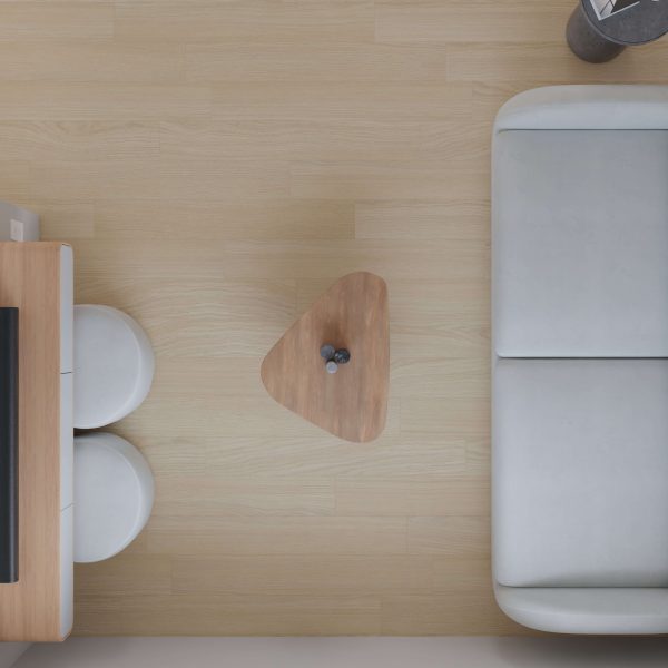 Minimalist living room, top view: Bridgeland light wood floor, light grey sofa on the right, small wooden coffee table with two vases in the center, and a desk with two round stools on the left.