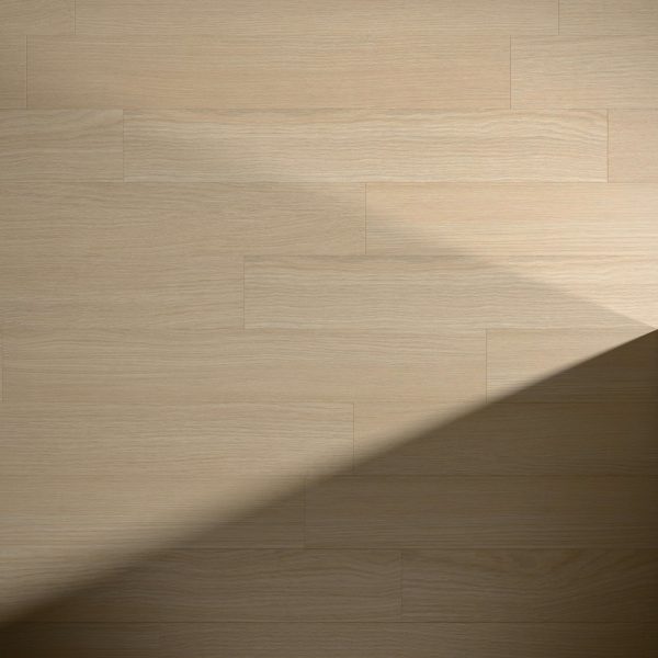 A section of Bridgeland light-colored wooden floorboards with a diagonal shadow across the surface, highlighting the natural wood grain and smooth finish.