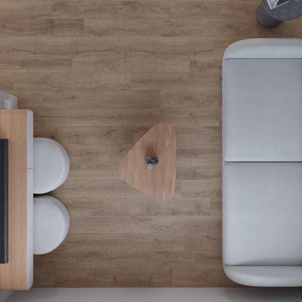 A minimalist living space featuring the Lowell light gray sofa, a triangular wooden coffee table, two round white stools, and a light wood floor, viewed from above.