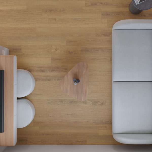 A minimalist living room with light wood flooring features the Willcox light gray sofa, a small triangular wooden coffee table, two round white stools, and part of a wooden desk, all viewed from above.
