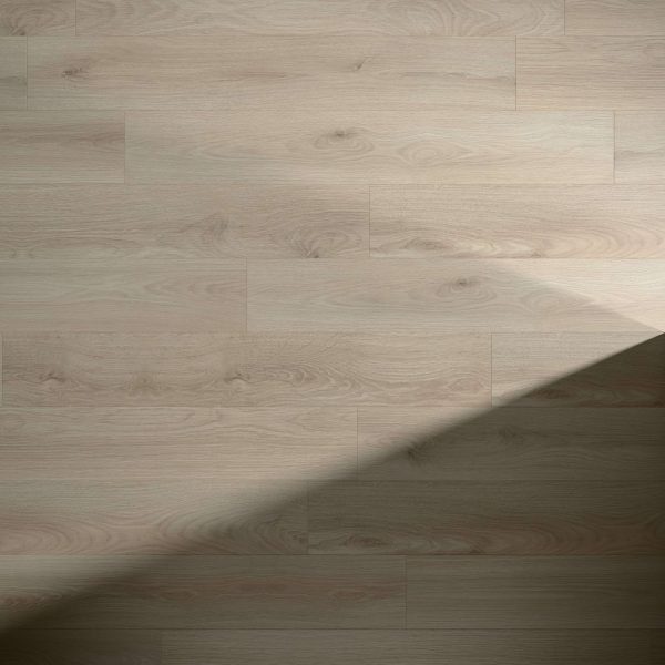 Tekarra features a light wood tone with a visible grain pattern. A soft shadow extends diagonally from the bottom right corner, enhancing the floor’s depth and dimension.