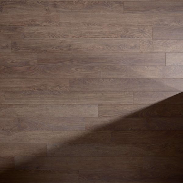 A Rockwood wooden floor with a natural brown finish and visible grain patterns, partially covered by a shadow cast diagonally across the lower right corner.