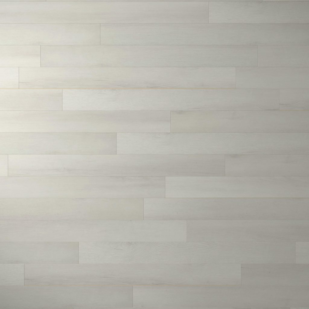 Glenbrook features light gray wooden floorboards set in a horizontal pattern for a clean, modern, minimalist look. The subtle wood grain and uniform tones create a sleek and cohesive surface.