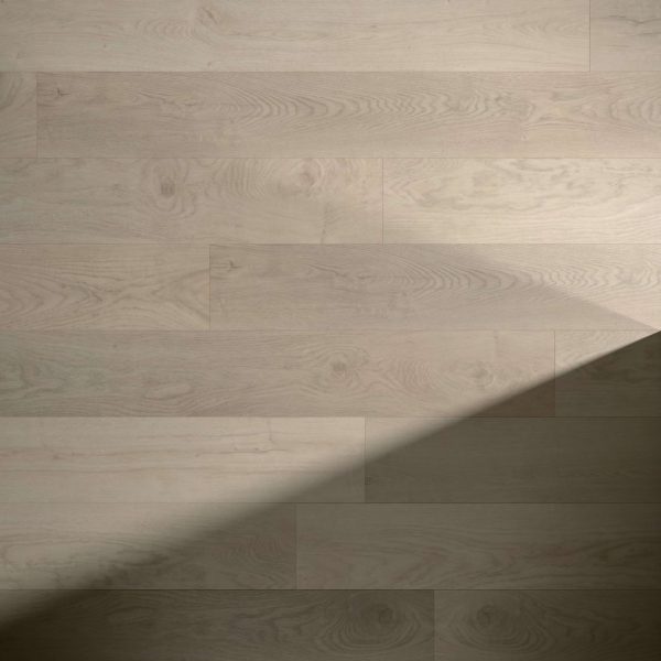 Barossa* features light-colored wooden floorboards with subtle grain patterns. A diagonal shadow crosses the bottom right corner, creating contrast on the otherwise evenly lit Barossa* surface.
