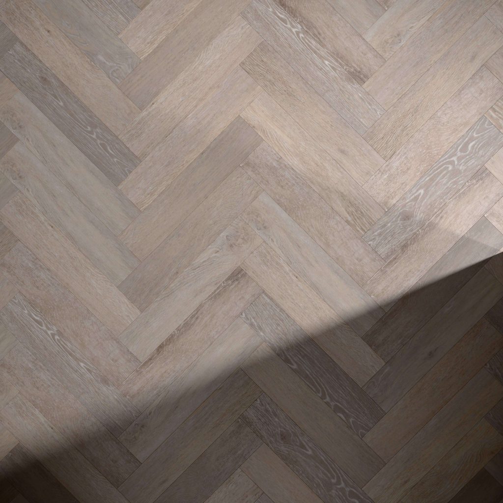 Beach House* herringbone pattern wood flooring in light brown tones, with a shadow cast diagonally across the lower right corner.
