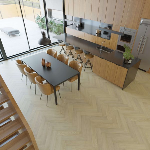 The Shelbourne kitchen features wood-paneled cabinets, black countertops, a dark dining table with six tan chairs, island bar stools, and large windows that overlook the patio.