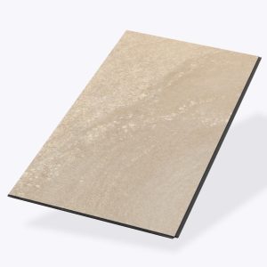 The Cliff Island tile, a rectangular beige piece with a subtle natural stone texture, is displayed on a white background at an angle highlighting its thin profile and detailed surface.