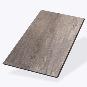 Cenere Grey is a rectangular, gray ceramic tile with textured, stone-like visuals and subtle shading and veining for a natural, realistic look.