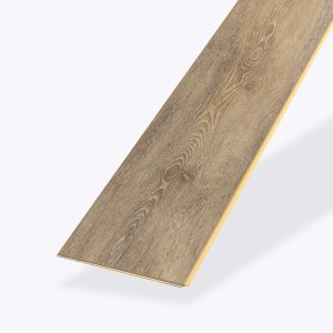 A single plank of Harrington* light brown wood-look flooring with realistic wood grain, displayed at an angle against a plain white background.