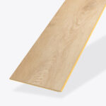 The Dorrigo* is a single wooden floor plank with a light natural finish, visible wood grain, and knots, displayed on a plain white background.