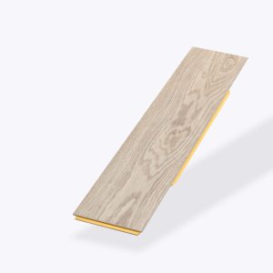 A single Wentworth* light wood laminate flooring plank with subtle grain patterns is displayed on a light background, showing a yellow interlocking edge underneath.