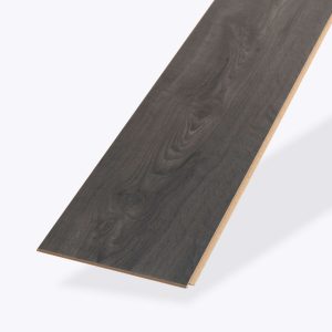A single Erebus Oak laminate flooring plank with visible wood grain is shown on a plain light background. The plank is angled diagonally to showcase its smooth texture and beveled edge.