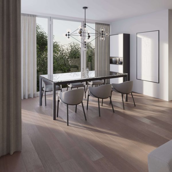 A modern dining room features the Bramble Oak glass table, six gray chairs, a geometric chandelier, large windows with sheer curtains, wood flooring, and minimalist wall art. Sunlight streams in for a bright, airy atmosphere.