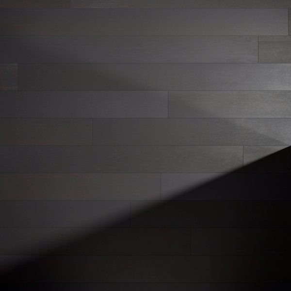 Cityscape Oak* features dark wooden planks arranged horizontally, with a diagonal shadow creating a striking contrast between illuminated and shaded areas.