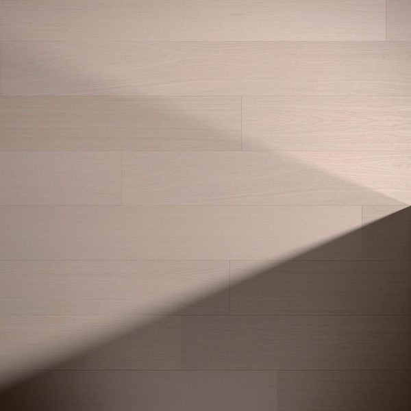 Everglade Oak R&Q features a light brown wooden floor with visible grain patterns and horizontal planks; a diagonal shadow crosses the lower half, highlighting the contrast between illuminated and shaded areas.