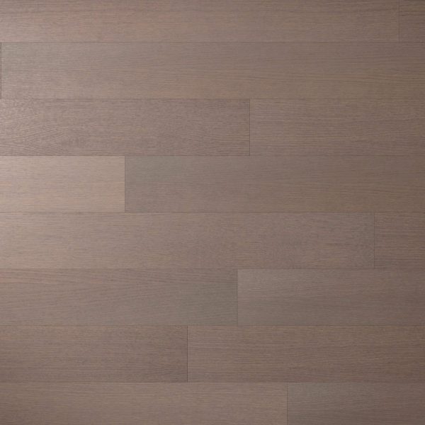 Close-up view of Veneto Oak R&Q flooring featuring horizontal, evenly spaced planks in a consistent light brown shade with a smooth texture, creating a clean and uniform pattern.