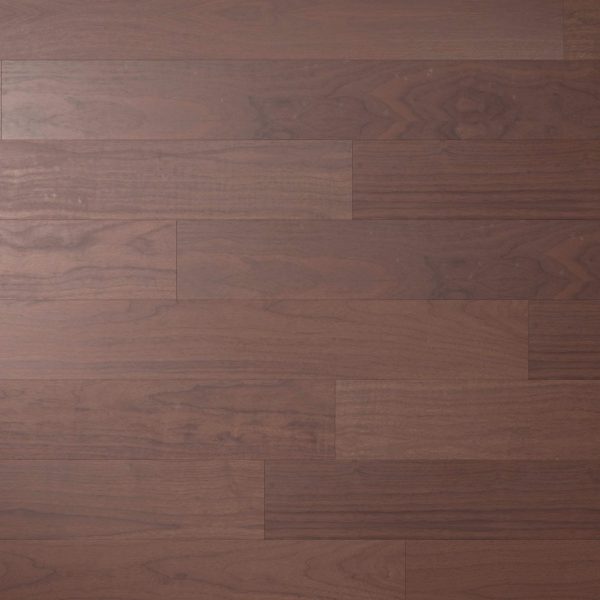 A close-up view of Walnut Natural* floorboards in a staggered pattern, highlighting the reddish-brown hue, natural wood grain, and rich texture.