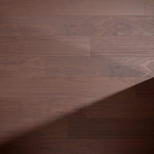 Walnut Natural*: Dark brown wooden floorboards featuring a natural grain pattern. A diagonal shadow runs from the bottom right to the center, highlighting contrast on the surface.