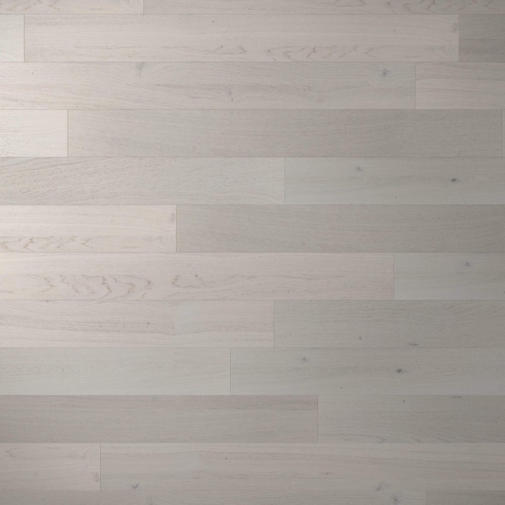Crema Rustic Oak* offers light gray wooden floorboards arranged horizontally, showcasing subtle wood grain and knot details for a clean, modern look.