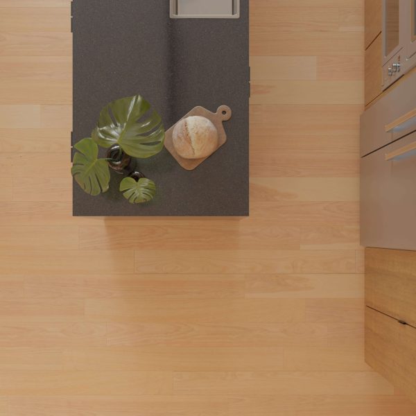 A top-down view of a modern kitchen island with a dark countertop, a plant in a vase, and bread on a wooden cutting board, set against Hickory Natural* flooring.
