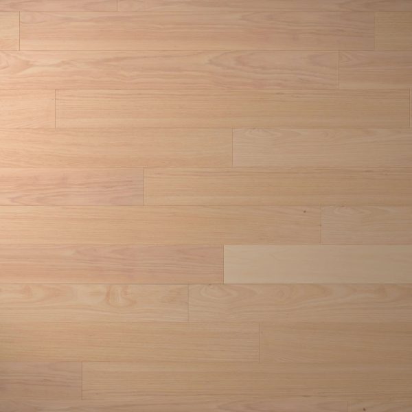Hickory Natural* features a light-colored wooden floor with horizontal planks, showcasing a smooth, even surface with subtle natural wood grain patterns and slight color variations.