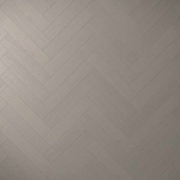 Castle Rock Oak* (Right) features a light grey, wood-grain floor in a matte finish. Its herringbone pattern forms a striking zigzag design, adding texture and visual appeal to any space.