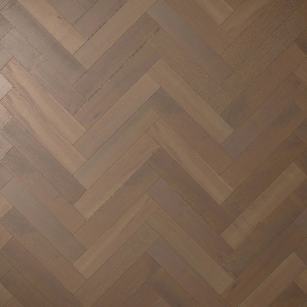 Maple Arabica* (Left) features brown wooden flooring in a herringbone pattern, with alternating diagonal planks and subtle variations in color and grain for a classic, textured appearance.