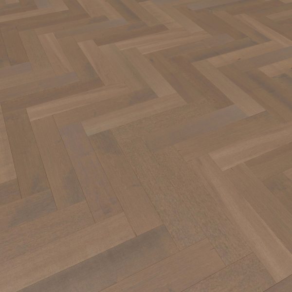 A close-up of Maple Arabica* (Left) parquet flooring in a herringbone pattern, showcasing medium brown planks with natural wood grain and subtle color variations.