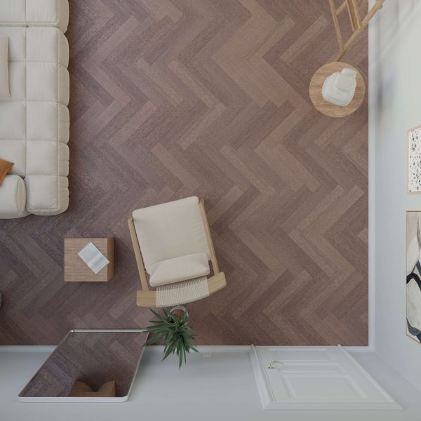 Overhead view of a modern living room featuring Hickory Americano* (Left) zigzag-patterned wooden floor, a beige armchair, small tables, sofa, green plant, and abstract art on white walls.