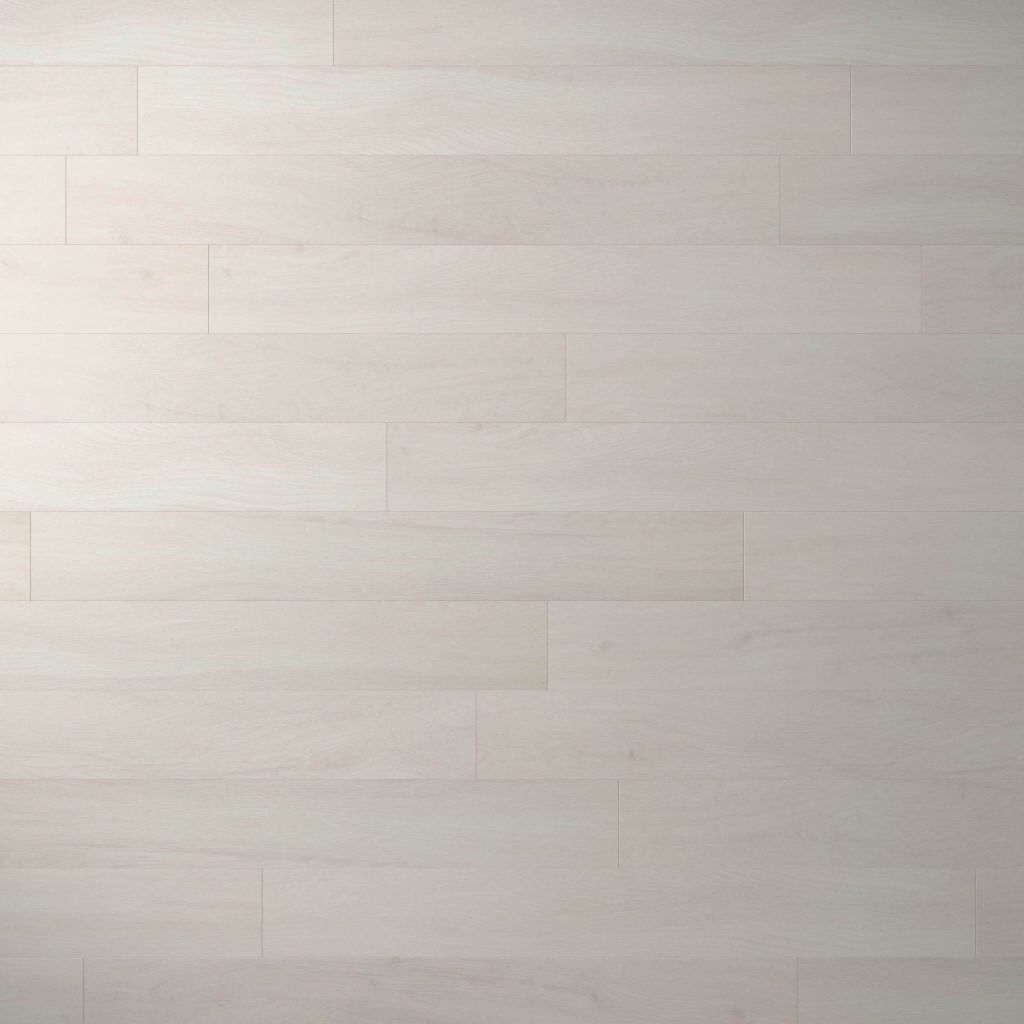 Paris Oak features light-colored wooden flooring with horizontal planks in a staggered pattern, offering a smooth, even surface and subtle wood grain texture.