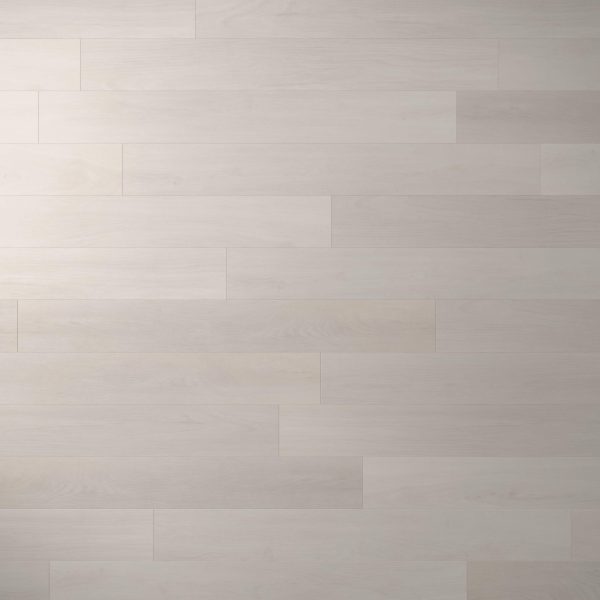 Whistler Oak floor planks feature a light color and subtle wood grain, arranged in a staggered pattern for a smooth, modern look.