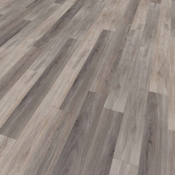A close-up of Tokyo Oak* vinyl flooring showcases long, rectangular planks with visible wood grain texture in gray and light brown tones.