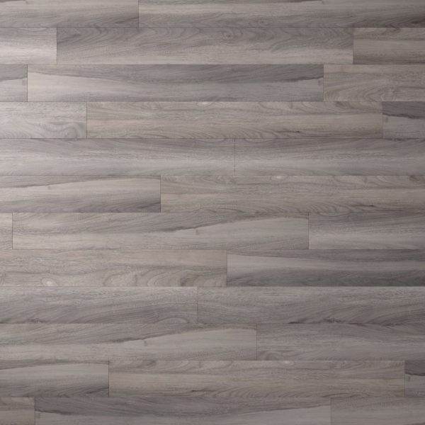 Rio Walnut* features gray-toned wooden floorboards with a staggered layout, visible wood grain, and subtle shading variations across each plank.