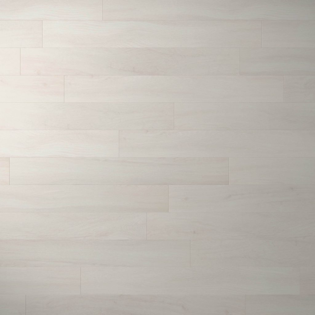 Paris Oak features wide, light-colored planks with a natural, neutral tone and subtle grain. The staggered layout creates a smooth, clean appearance perfect for modern spaces.