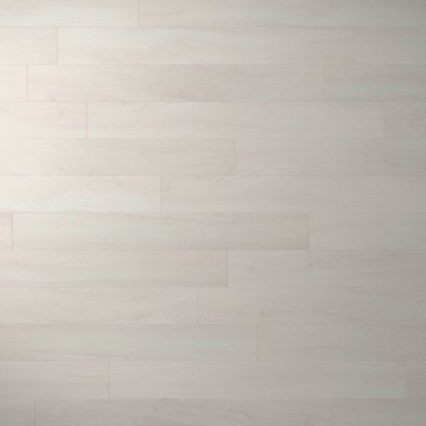 Paris Oak features wide, light-colored planks with a natural, neutral tone and subtle grain. The staggered layout creates a smooth, clean appearance perfect for modern spaces.