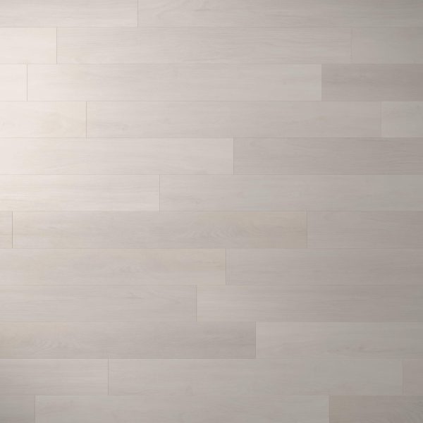 Whistler Oak features light-colored wooden planks arranged in a staggered pattern, highlighting subtle wood grain and a smooth, matte finish.